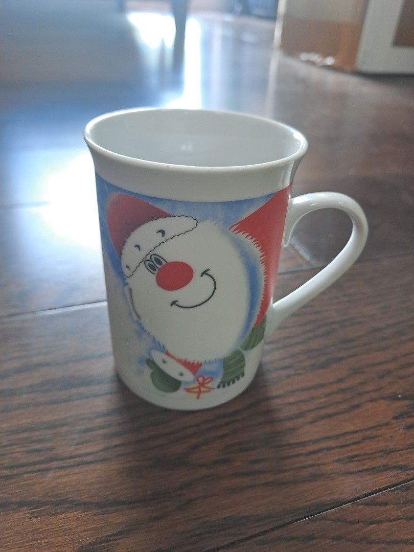 Christmas Themed Mug (Category: Coffee & Tea Tableware) located in Manila. Submitted by joanbalde39643 (Listing ID 1395834518, Image 1). Description: - Christmas-themed mug - Features a Santa Claus design - White handle and interior - Made of ceramic - Ideal for hot beverages.
