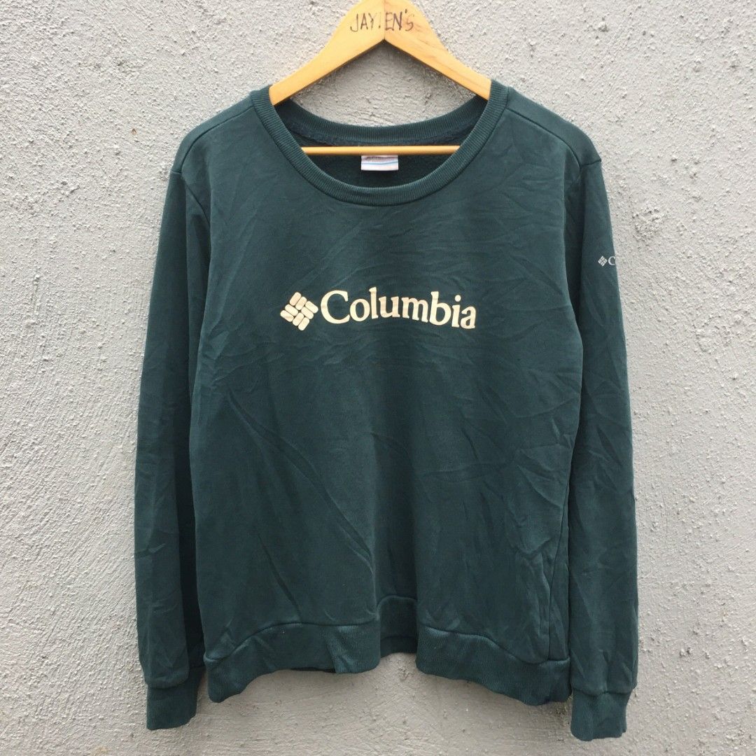 Columbia Green Sweatshirt XL (Category: Coats, Jackets and Outerwear) located in Bulacan. Submitted by zcollection2020 (Listing ID 1395733754, Image 1). Description: - Columbia sweatshirt - Size: XL - Features Columbia logo - Made in Bangladesh - Material: 80% cotton, 20% polyester - Minor stain on sleeve - Care label visible in photos.