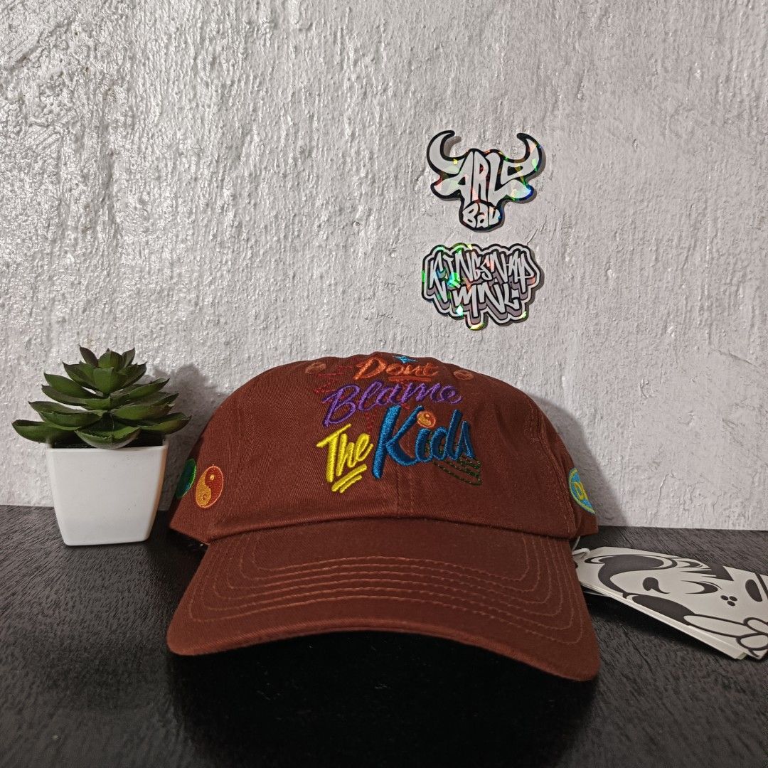 Don't Blame The Kids Cap (Category: Caps & Hats) located in Quezon City. Submitted by Hatlits (Listing ID 1395883226, Image 3). Description: - Embroidered "Don't Blame The Kids" design - Classic six-panel cap - Curved brim - Made of durable fabric - Available in multiple colors - Brand new with tag.
