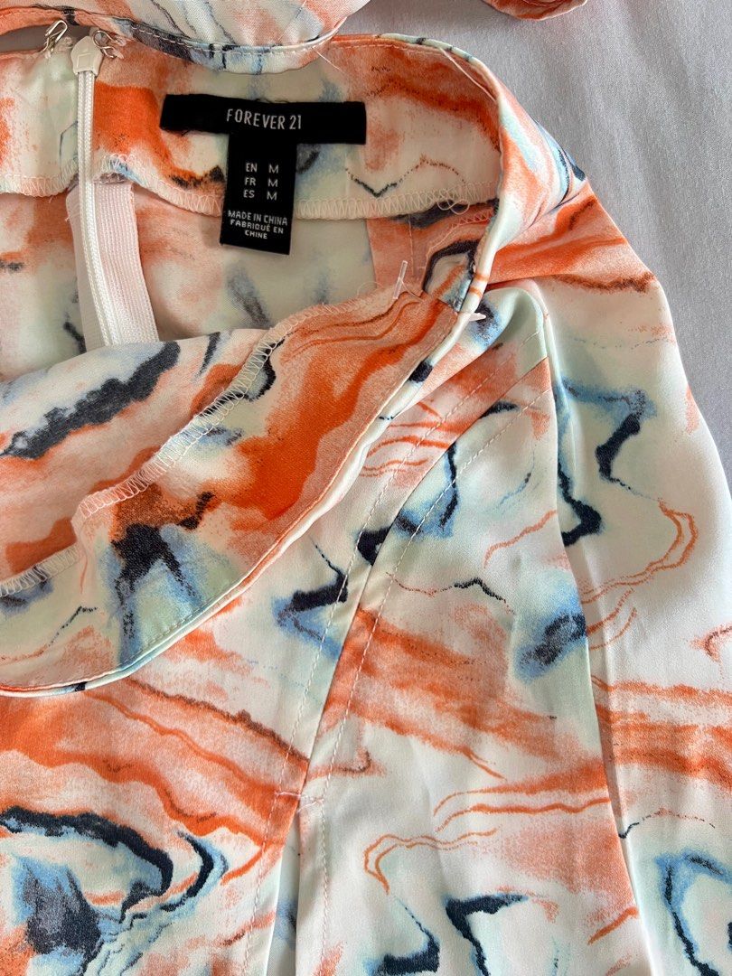 F1 printed coordinates summer blouse and skirt set (Category: Sets or Coordinates) located in Quezon City. Submitted by bubspreloved (Listing ID 1395865057, Image 3). Description: Used once in an event. Top is S, skirt is M.