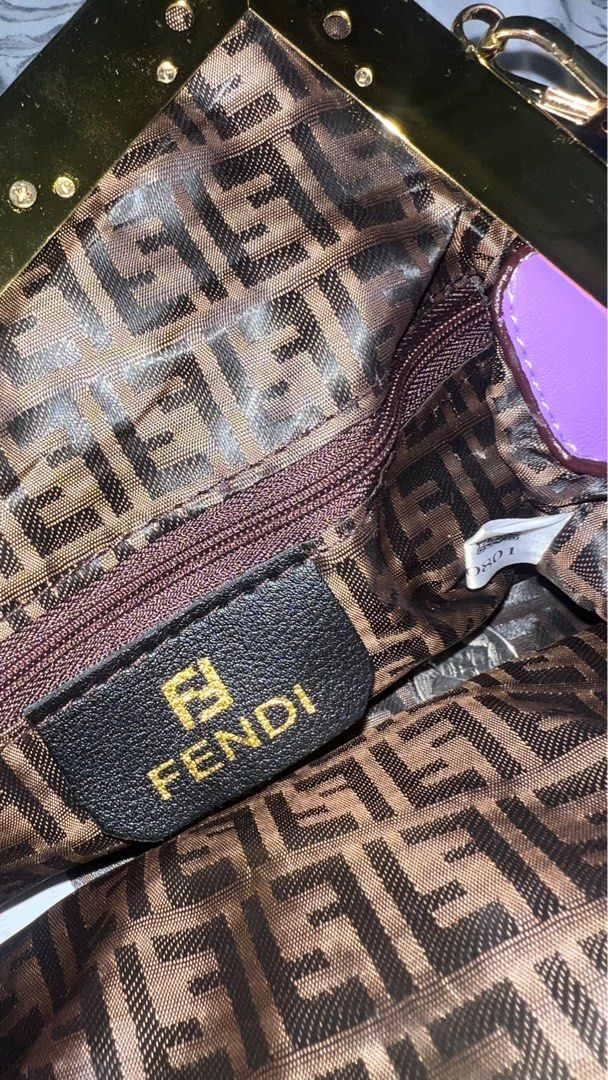 Fendi First Purple Shoulder/Sling Bag (Category: Luxury Bags & Wallets) located in Quezon City. Submitted by watchyoursteff (Listing ID 1395737120, Image 2). Description: - Fendi shoulder bag (OFF) - Vibrant purple exterior - Gold-toned frame - Signature Fendi logo print interior - Includes shoulder/sling strap - Clasp closure RFS: decluttering, too many bags.