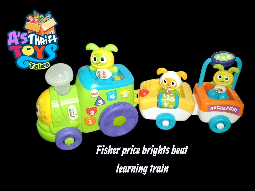 Fisher Price Bright Beats Learning Train (Category: Educational & Learning Toys) located in Iligan City. Submitted by shehabdor98515 (Listing ID 1395921954, Image 1). Description: - Fisher Price Bright Beats Learning Train - Interactive train cars with numbers and letters - Engaging lights and sounds - Designed for toddlers and young children - Fun and educational toy.