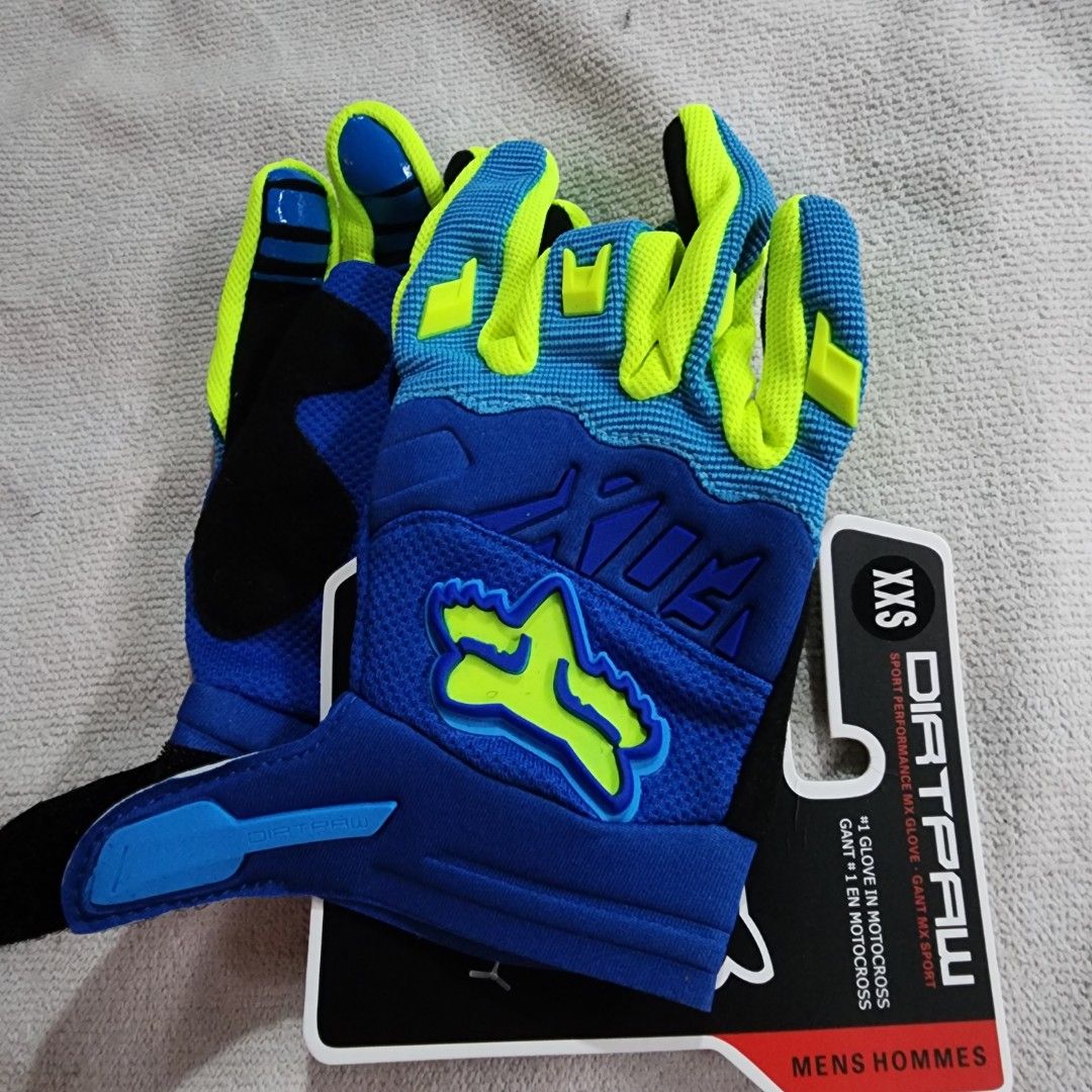 Fox Dirtpaw MX Gloves XXS (Category: Bicycles) located in Santa Maria. Submitted by laterspirit (Listing ID 1395796117, Image 2). Description: - Fox Dirtpaw MX gloves - Size: XXS - Color: Blue and Yellow - Designed for motocross - Features the Fox logo - Condition: New with tags.