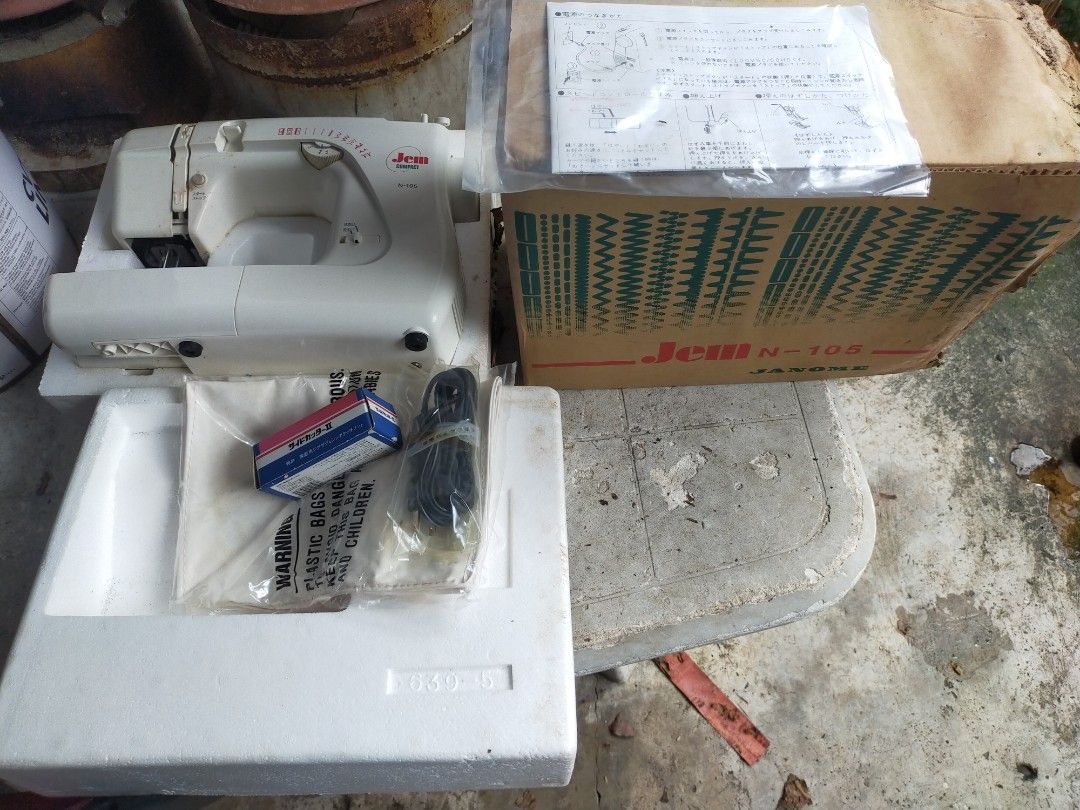 Janome Jem Compact N-105 Sewing Machine (Category: Craft Supplies & Tools) located in Taytay. Submitted by archie2427 (Listing ID 1395892936, Image 1). Description: - Janome Jem Compact N-105 sewing machine - Includes original box, accessories, and manual - Features various stitch patterns - Comes with foot attachment and power cord - White color - In good working order - Ideal for sewing projects.