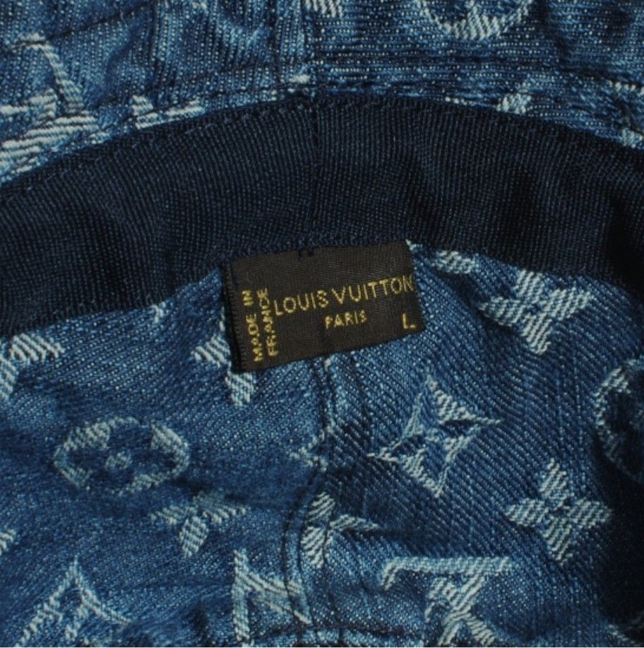 Louis Vuitton Denim Bucket Hat (Category: Hats & Beanies) located in Caloocan City. Submitted by itsmemhaqueen (Listing ID 1395813386, Image 2). Description: - Authentic Louis Vuitton bucket hat - Denim material - Features the iconic LV monogram pattern - Made in France - Size: L - Dark blue inner lining.