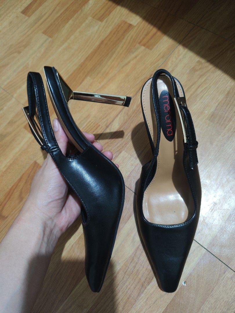 Meroma Black Formal Heels Size 37 (Category: Heels) located in Manila. Submitted by geederoca (Listing ID 1395845547, Image 3). Description: - Meroma black formal heels - Size 37 - Pointed toe design - Slingback strap - Gold accent - Includes original box (box shows wear and tear) -worn 3 times only -rfs: decluttering.