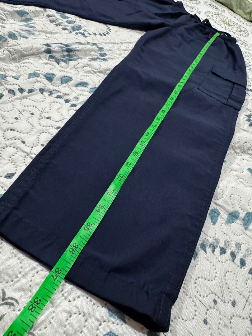 Navy Blue Scrub Suit Blouse and Cargo Pants (Category: Sets or Coordinates) located in San Mateo. Submitted by clairaaa (Listing ID 1395863708, Image 3). Description: - Navy blue scrub suit (1 pair available; 250 pesos each pair) - Includes a V-neck top with two front pockets. - Waist: 18 inches max stretch - Cargo pants .