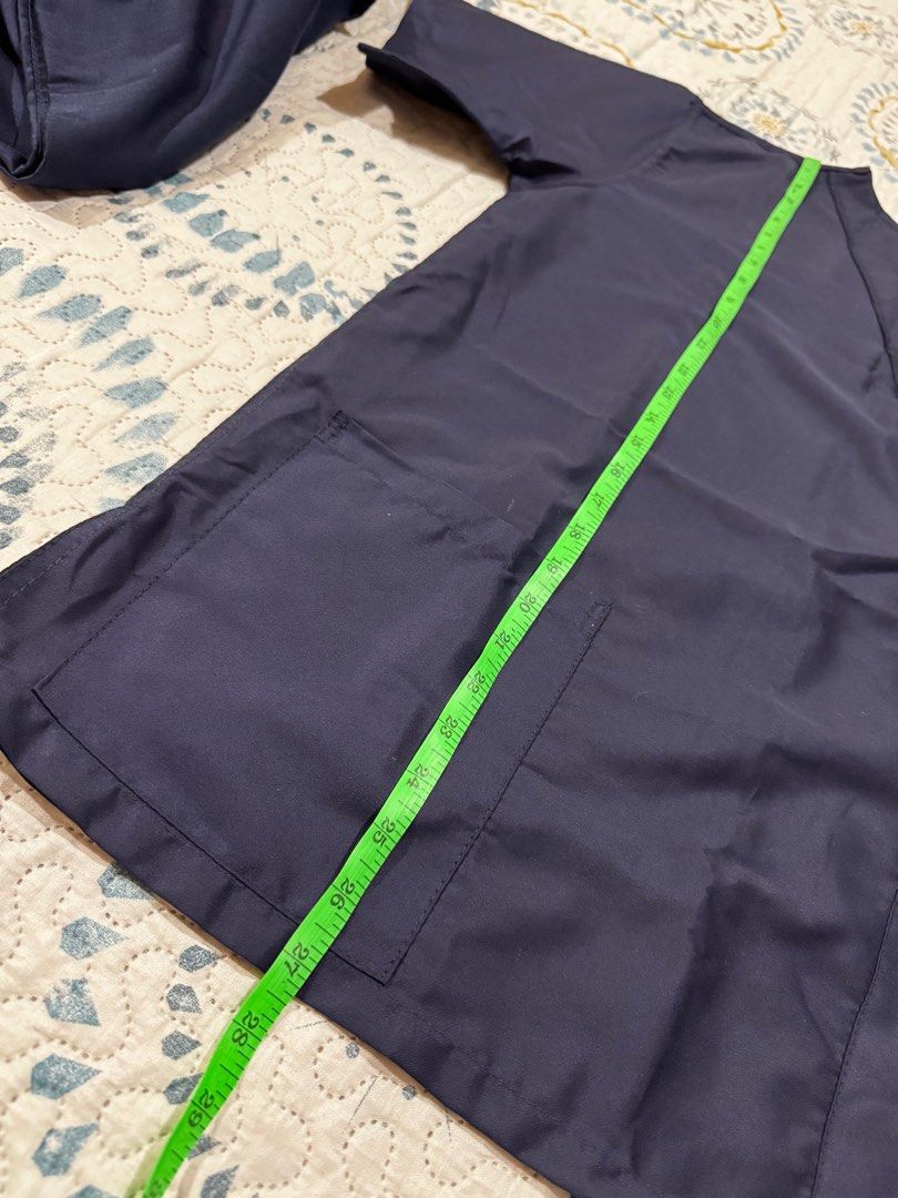 Navy Blue Scrub Suit Blouse and Cargo Pants (Category: Sets or Coordinates) located in San Mateo. Submitted by clairaaa (Listing ID 1395863708, Image 2). Description: - Navy blue scrub suit (1 pair available; 250 pesos each pair) - Includes a V-neck top with two front pockets. - Waist: 18 inches max stretch - Cargo pants .