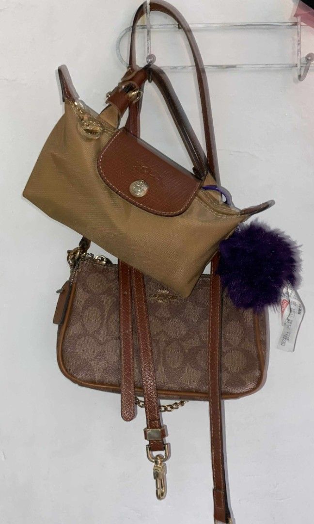 ❤️Negotiable Coach and Longchamp Mini Sling Bag (Bundle) (Category: Luxury Bags & Wallets) located in Pasay City. Submitted by marikn0ws (Listing ID 1385996403, Image 1). Description: Helping a friend:) NEGOTIABLE Longchamp and Coach Mini Sling Bag Bundle Selling both for 4k as a bundle only!! Longchamp - Used, but in very good condition - Bought from Carousel (authentic) - Comes with detachable sling strip - Originally valued at $110 SRP Coach -