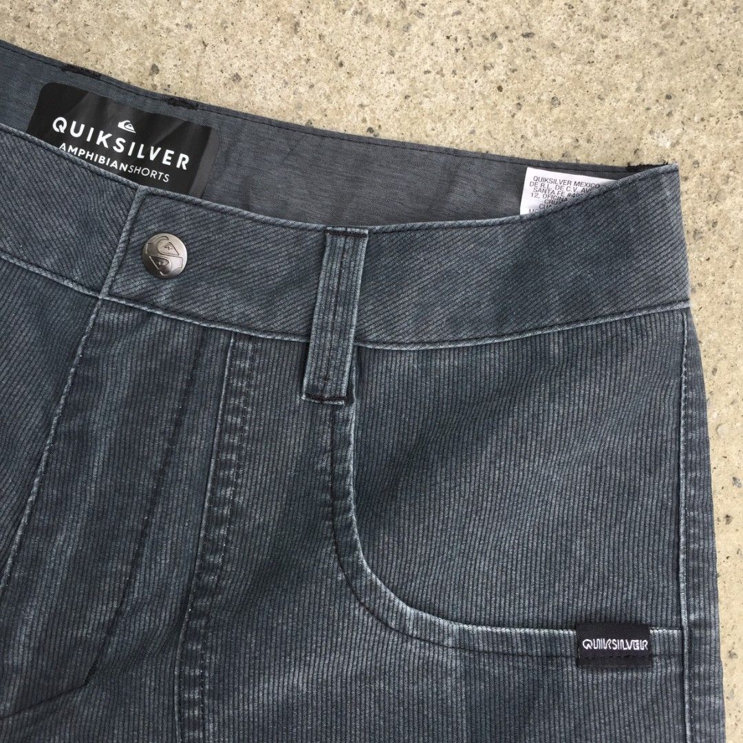 Quiksilver Amphibian Shorts (Category: Shorts) located in Bulacan. Submitted by zcollection2020 (Listing ID 1395734442, Image 3). Description: - Quiksilver Amphibian shorts - Color: Dark grey - Features a button closure - Multiple pockets - Corduroy-like texture - Made in Vietnam - Small Quiksilver logo on front pocket.