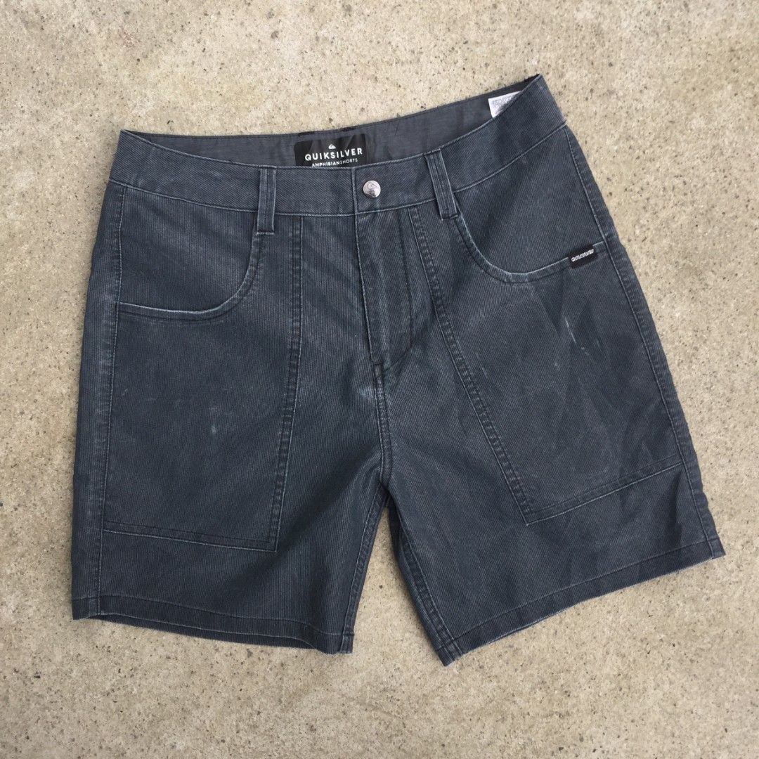 Quiksilver Amphibian Shorts (Category: Shorts) located in Bulacan. Submitted by zcollection2020 (Listing ID 1395734442, Image 1). Description: - Quiksilver Amphibian shorts - Color: Dark grey - Features a button closure - Multiple pockets - Corduroy-like texture - Made in Vietnam - Small Quiksilver logo on front pocket.