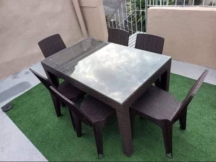 Rattan Dining Table Set with 6 Chairs (Category: Tables & Sets) located in Quezon City. Submitted by joycemanahan (Listing ID 1395846816, Image 2). Description: - Rattan dining table set with six chairs - Rectangular table top - Woven chair design - Available colors: Black and Brown - Suitable for indoor and outdoor use - Perfect for dining and entertaining - Durable and easy to clean Cash on delivery Quezon city location 09197697979.