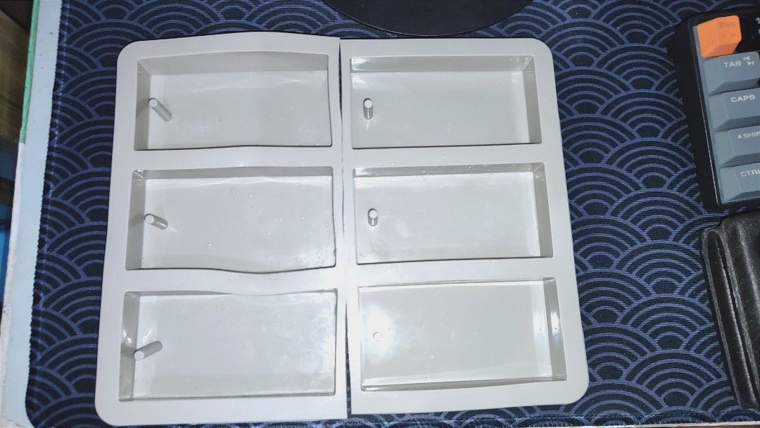 Silicone Soap Mold - Six Grid Rectangle (Category: Bakeware) located in Dipolog. Submitted by mikkoatill43159 (Listing ID 1395898350, Image 1). Description: - Silicone soap mold with six rectangular cavities. - Ideal for handmade soaps. - Suitable for kitchen baking. - Temperature resistant: -40°C to 230°C. - Easy to clean and use. - Designed for environmental protection and high temperature resistance..