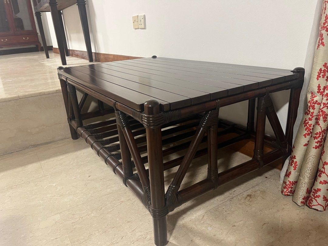 Solid cane Coffee Table (Category: Tables & Sets) located in Singapore. Submitted by debbiewee (Listing ID 1395905544, Image 1). Description: Moving out sale. Solid cane coffee table for sale. No visible defects. Buyer to arrange for own delivery. - Features a slatted top - Includes a lower shelf for storage - Unique frame design - Ideal for living rooms and lounges - Solid and sturdy construction Dimensions: Length: 101cm Height: 43cm Width: 63c