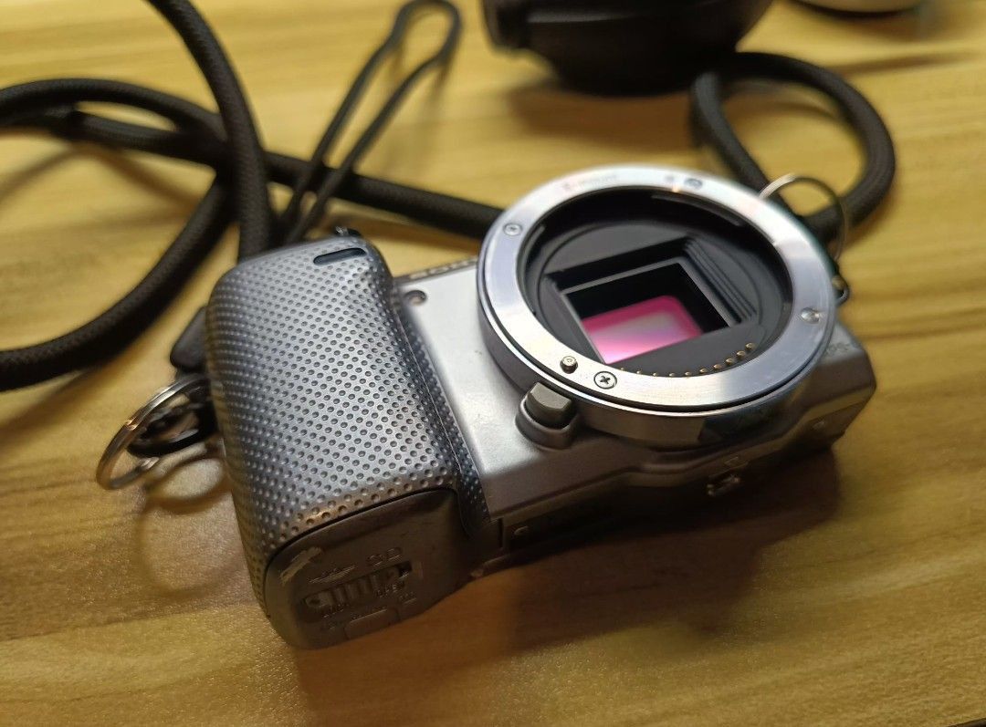 Sony NEX-5T Mirrorless Camera with kit Lens (Category: Cameras) located in Quezon City. Submitted by art.one (Listing ID 1395888182, Image 1). Description: Sony NEX5T 16.1mp APSC Camera Condition: working well, Takes Good Picture and FullHD video. issues: body: issues are the scratches and faded paint due to use and dent at the lower left side of the screen. LCD: may parang dirt sa gilid ng LCD see last picture but touch screen and LCD is working