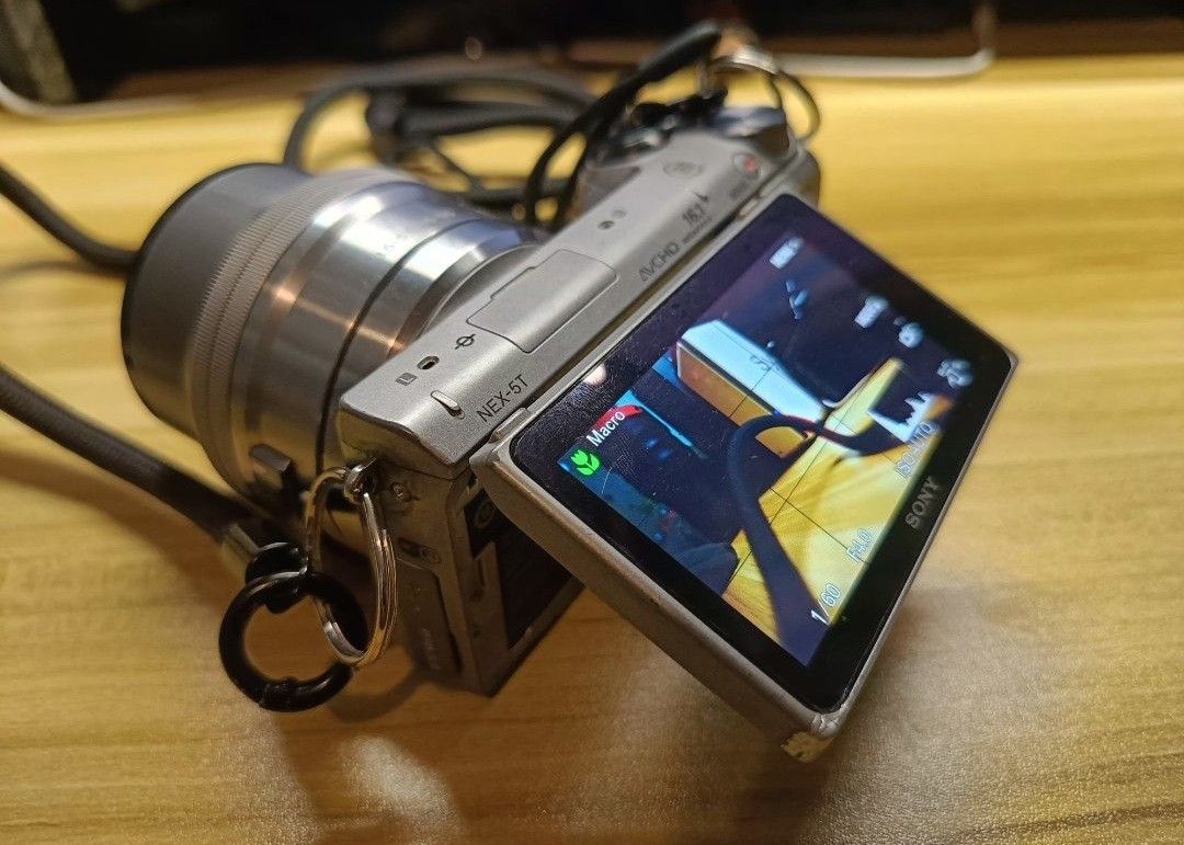 Sony NEX-5T Mirrorless Camera with kit Lens (Category: Cameras) located in Quezon City. Submitted by art.one (Listing ID 1395888182, Image 2). Description: Sony NEX5T 16.1mp APSC Camera Condition: working well, Takes Good Picture and FullHD video. issues: body: issues are the scratches and faded paint due to use and dent at the lower left side of the screen. LCD: may parang dirt sa gilid ng LCD see last picture but touch screen and LCD is working