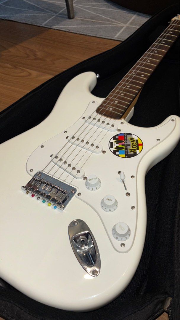 Squier Stratocaster by Fender (Category: Musical Instruments) located in Pasig City. Submitted by unwanteditemsfrommycloset (Listing ID 1395765307, Image 1). Description: 🔥used but not abused 🔥tried to learn how to play but gave up after 3 months… never used it since 🔥no hidden issues 🔥comes with fender cords (with extra cord), fender strap, and capo rfs: not in use anymore:( Pm if interested!!.