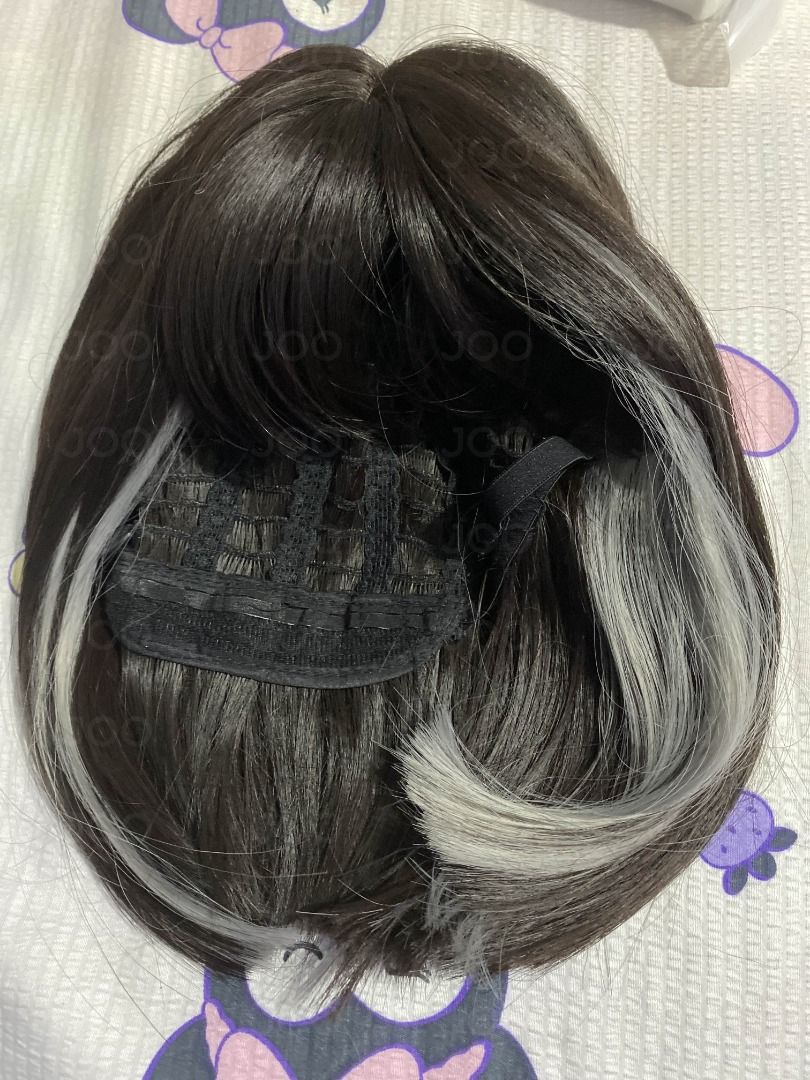 Two-Tone Bob Wig / Peekaboo style Wig (Category: Hair Accessories) located in Dumaguete. Submitted by joobydoobydoo (Listing ID 1395924330, Image 2). Description: - Two-tone design: dark base with silver streak - Bob cut with middle part and full bangs - Has fake scalp - Never used, never cut, basically brand new. Only used to try on. RFS: Bought it for daily use but never got to use it. I'm from the Visayas, buyer will shoulder the shipping fee.