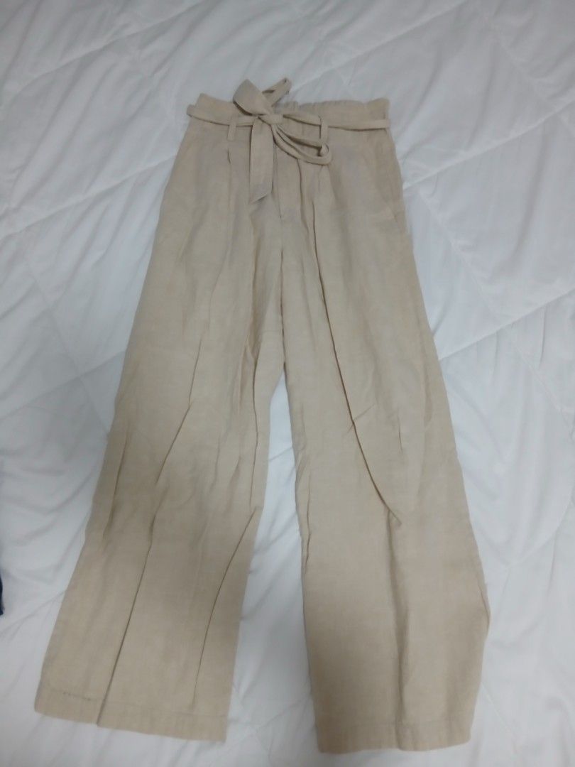 Uniqlo pants bundle (Category: Other Bottoms) located in Makati City. Submitted by abbydeclutters (Listing ID 1395896597, Image 2). Description: take both uniqlo pants for 500 - low waist denim pants (no noticeable flaws) - cotton linen pants (obvious signs of usage) both in small .