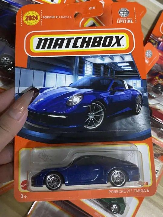 US CARD Matchbox Porsche 911 Targa 4 (Category: Vehicle & Diecast Models) located in Manila. Submitted by rufustilinskitwo (Listing ID 1395778841, Image 1). Description: - Matchbox Porsche 911 Targa 4 - 2024 Series - Blue diecast metal car - New in packaging - Suitable for ages 3 and up.