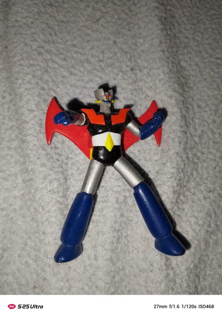 Vintage Robot Action Gashapon Figures (Category: Figurines & Statues) located in Manila. Submitted by marcus42 (Listing ID 1395844448, Image 2). Description: - Vintage robot action figure set. - Features various robot designs. - Includes different colors and accessories.mazinger z-400,mekanda-400,brave reideen-300,getter 2-200,gaiking -250,Pegas of Tekkaman fame -150 - Some figures have unique features like wings and bows. - Made of plastic. - Gr