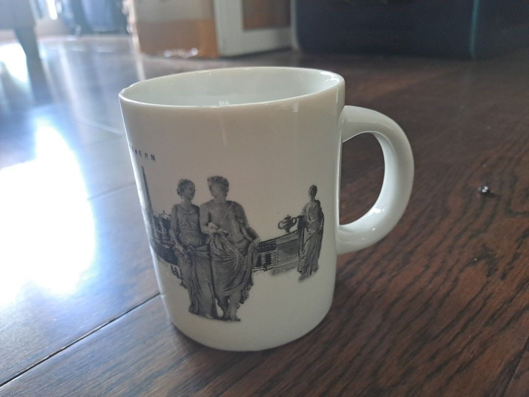 Vintage Souvenir Mug (Category: Coffee & Tea Tableware) located in Manila. Submitted by joanbalde39643 (Listing ID 1395836746, Image 2). Description: - Vintage ceramic mug - Features a black and white European landmark design - White base color - Curved handle - Great for mug collectors - Unique gift idea.