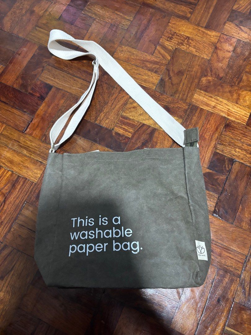 Washable Paper Bag - Sling Olive (Category: Cross-body Bags) located in Manila. Submitted by jing3021 (Listing ID 1395870167, Image 2). Description: Made of natural fiber, chemical free Washing machine washable Carries up to 4kg weight Comes with 2 handles 100% reusable tote Paper-like texture.