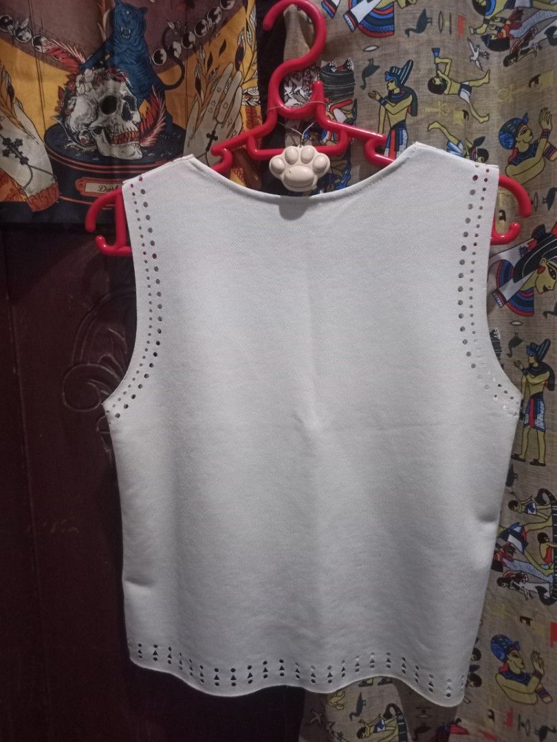 white cocktail glass pattern, decorative cut-outs tank top (Category: Sleeveless) located in Burgos, Ilocos Sur. Submitted by n33dspac3 (Listing ID 1395797192, Image 2). Description: sf + displayed price only :) DIMES pit-to-pit : 17.32 inches / 44cm length : 20 in / 51cm hem width : 18.50 in / 47cm.