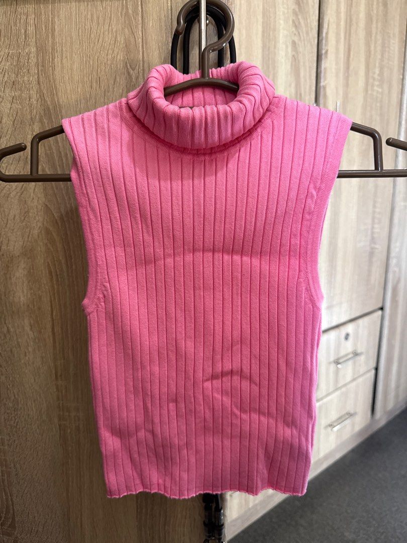Zara Sleeveless Turtleneck Top PINK (Category: Sleeveless) located in Antipolo. Submitted by articlesbyeve (Listing ID 1395804139, Image 3). Description: - Zara pink sleeveless turtleneck top - Size S - Ribbed knit design - High neckline - Fitted silhouette - Made in Bangladesh - Perfect for layering.