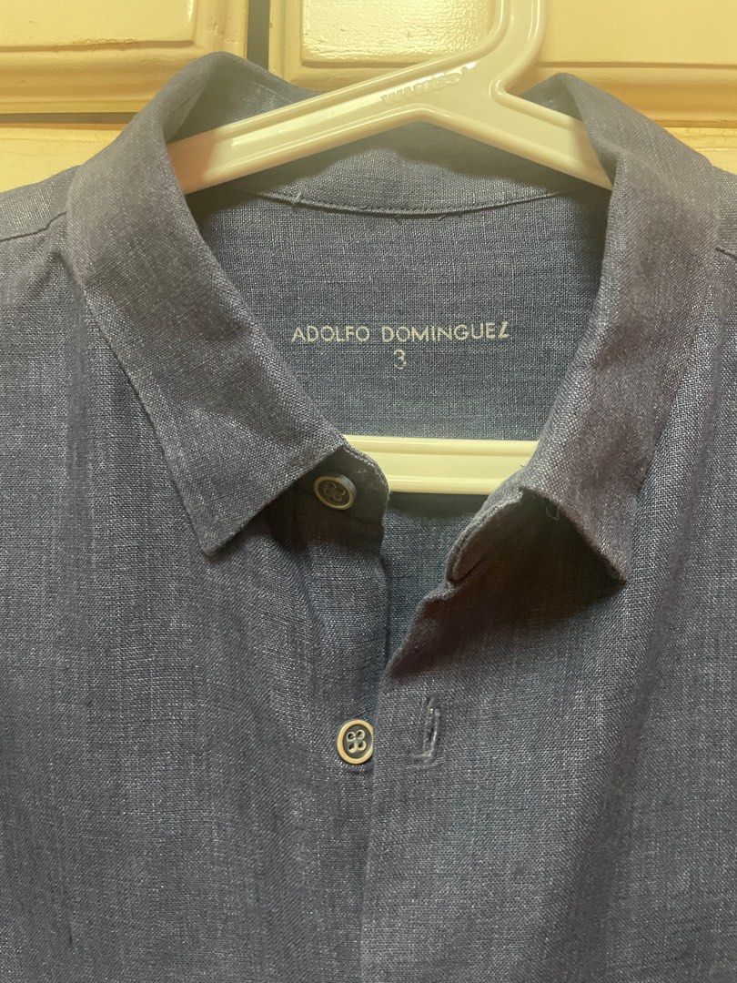 Adolfo Dominguez Long Sleeve Shirt (Category: Tshirts & Polo Shirts ) located in Makati City. Submitted by masaca (Listing ID 1397440641, Image 2). Description: - Adolfo Dominguez long sleeve shirt - Dark blue color - Size 3 - Button-down closure - Chest pocket - Classic collar - Textured fabric - Stylish and comfortable.