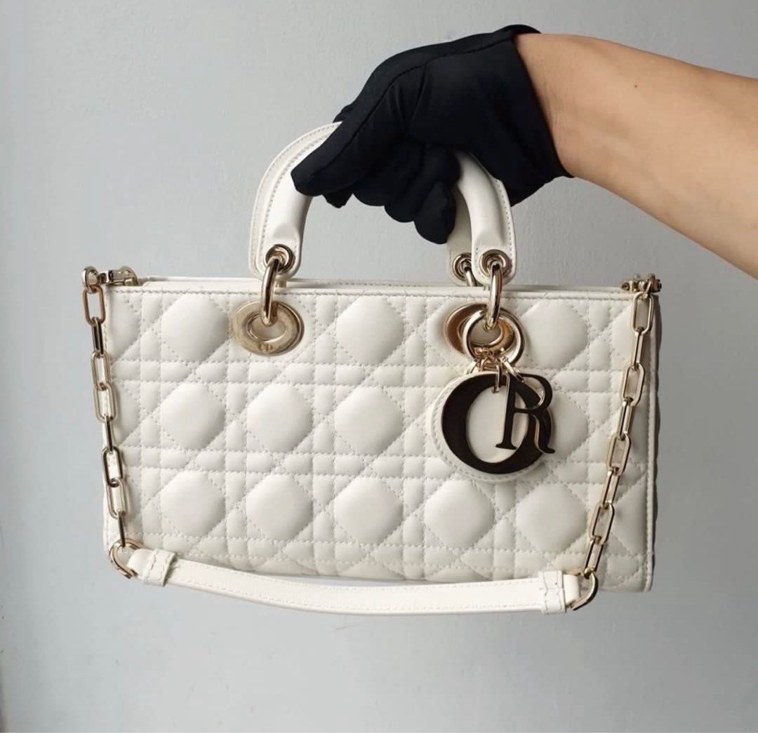Authentic Lady D-joy Medium (Category: Luxury Bags & Wallets) located in Manila. Submitted by eyy123 (Listing ID 1397461923, Image 1). Description: 💯 Authentic Dior Lady D-Joy in Medium Size Lambskin leather Complete inclusions: 2 straps, box, dust bag and paper bag With entrupy Can do meet up.