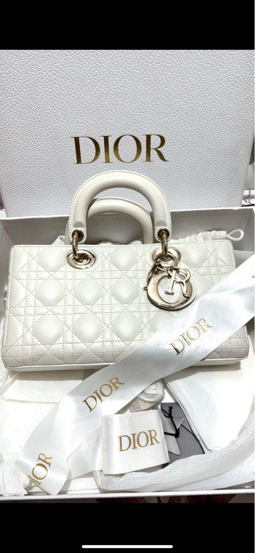 Authentic Lady D-joy Medium (Category: Luxury Bags & Wallets) located in Manila. Submitted by eyy123 (Listing ID 1397461923, Image 2). Description: 💯 Authentic Dior Lady D-Joy in Medium Size Lambskin leather Complete inclusions: 2 straps, box, dust bag and paper bag With entrupy Can do meet up.