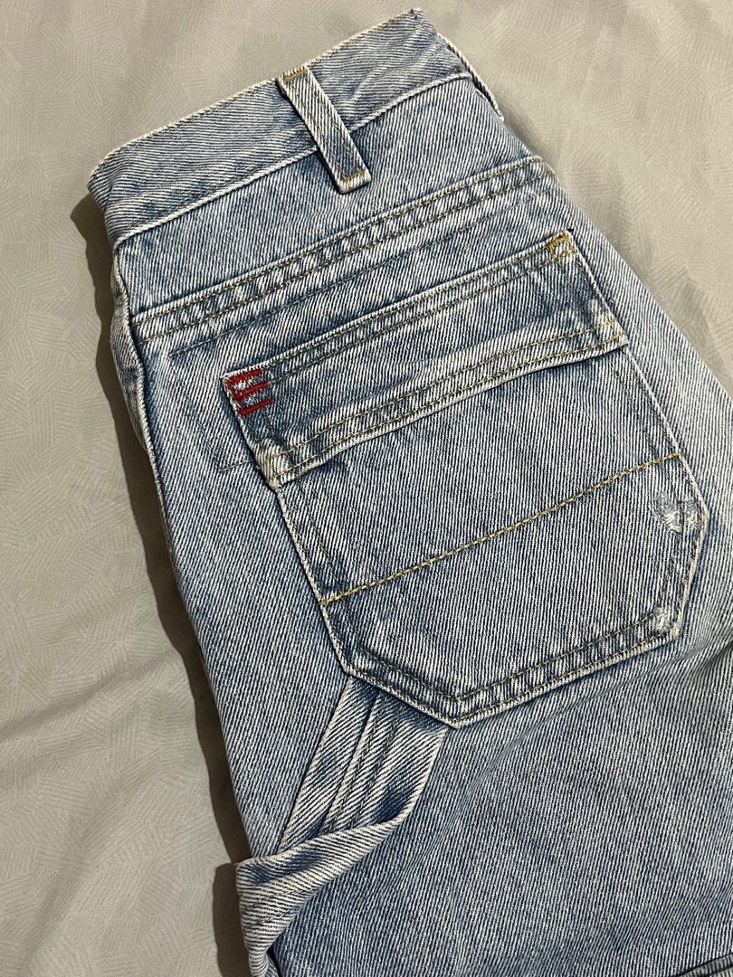 BDG High Rise Carpenter Jeans - Size 24 (Category: Jeans) located in Lapu Lapu. Submitted by freebear-196d (Listing ID 1397576350, Image 3). Description: - BDG high-rise carpenter jeans - Light wash - Size 24 - Straight leg fit - Classic five-pocket design - Additional carpenter pockets - Button and zipper closure - Made in China - BDG logo on back pocket.