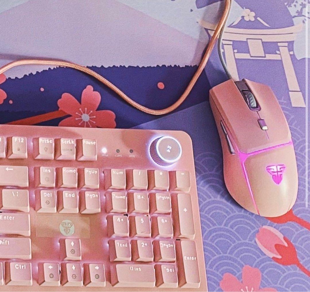 Fantech Pink Gaming Mouse (Category: Mouse & Mousepads) located in Paranaque City. Submitted by noctslivdeclutter (Listing ID 1397513142, Image 2). Description: - Pink Fantech gaming mouse - RGB lighting - Wired connection - Sleek design with Fantech logo - Scroll wheel and multiple buttons for gaming ‼️ Good as new. Bought 3 months ago. RFS: I was gifted a new mouse and I won't use it anymore. This is a good RGB wires gaming mouse that I used in