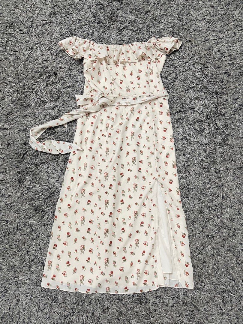 Floral Ruffle Dress (Category: Dresses) located in Manila. Submitted by romsjayne (Listing ID 1397523773, Image 2). Description: - Square neckline with ruffle detailing - Sleeveless design - Midi length - Tie waist - Small floral pattern - Lightweight and flowy fabric.