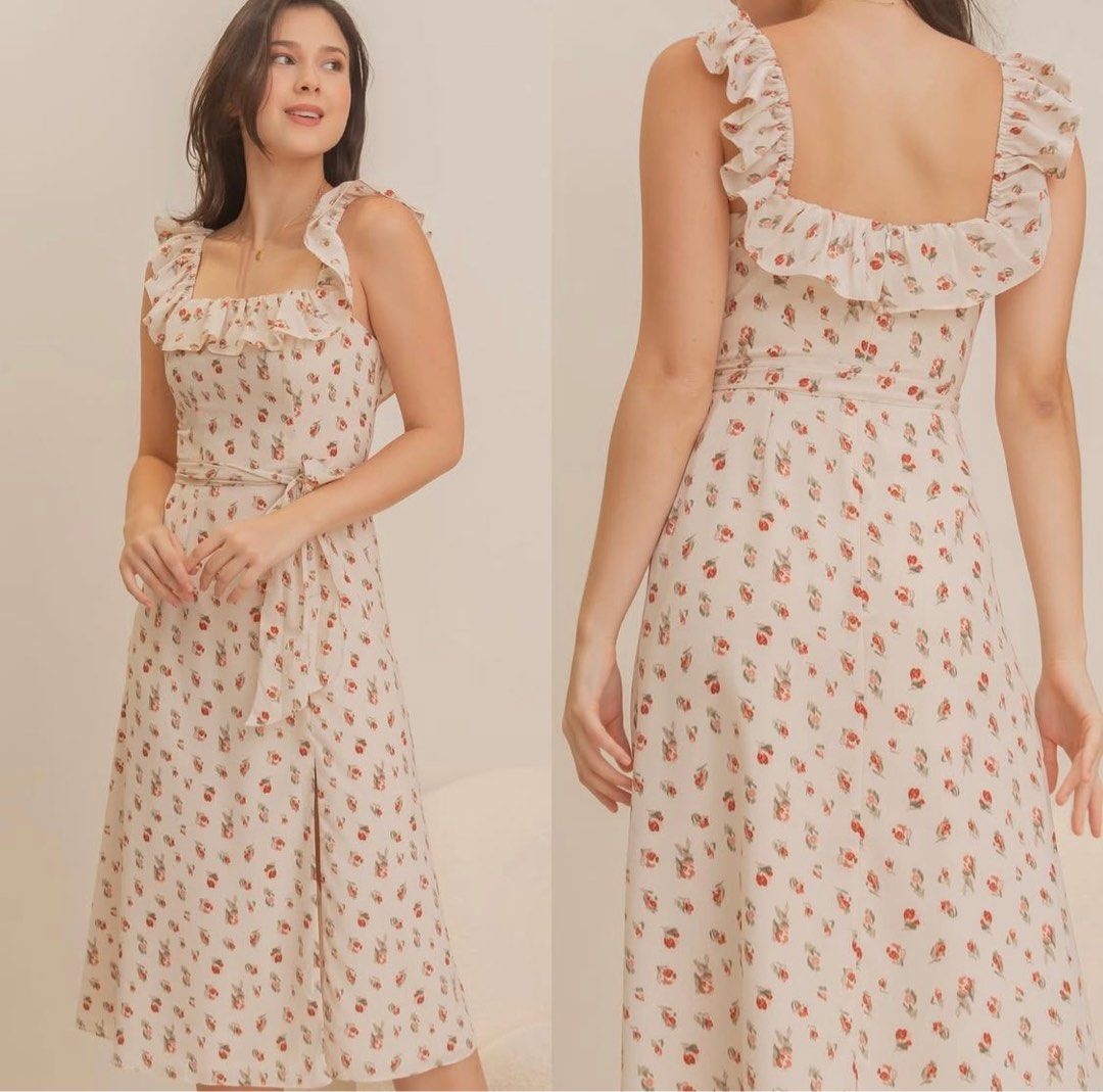 Floral Ruffle Dress (Category: Dresses) located in Manila. Submitted by romsjayne (Listing ID 1397523773, Image 1). Description: - Square neckline with ruffle detailing - Sleeveless design - Midi length - Tie waist - Small floral pattern - Lightweight and flowy fabric.