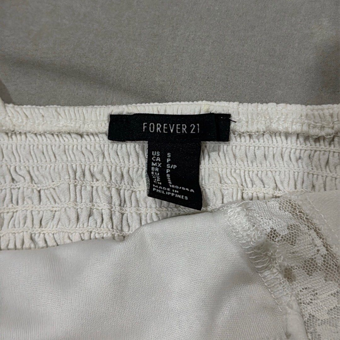 Forever 21 Crop Lacey Top (Category: Blouses) located in Quezon City. Submitted by laraveee (Listing ID 1397581294, Image 3). Description: Has staining near the garter on the bottom, haven’t tried cleaning/bleaching it MOP: GCash or Bank Transfer (BPI) MOD: Lalamove or Grab c/o Buyer.
