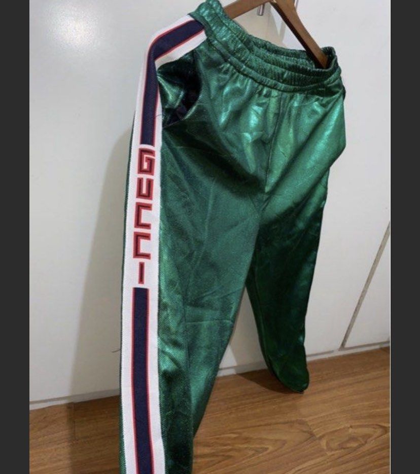 Gucci shiny green joggers (Category: Other Bottoms) located in Manila. Submitted by lucky2552 (Listing ID 1397526353, Image 1). Description: Can fit up to Medium for men Can fit up to Large for women.