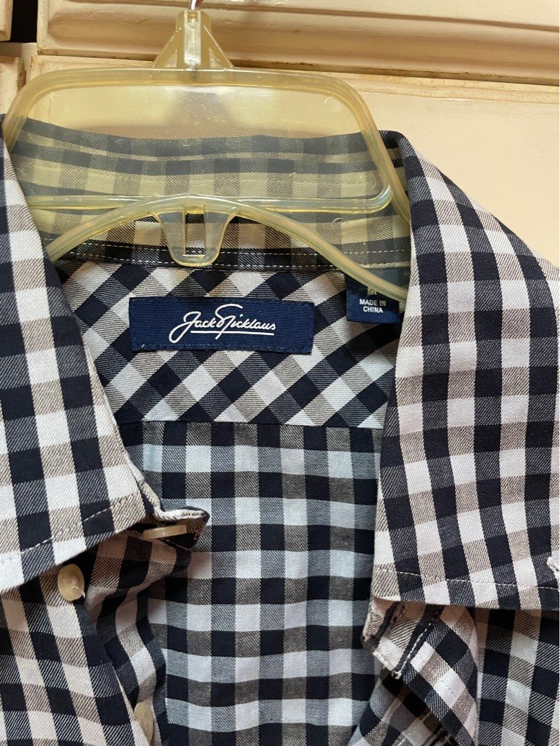 Jack Nicklaus Gingham Checkered Shirt (Category: Tshirts & Polo Shirts ) located in Makati City. Submitted by masaca (Listing ID 1397439673, Image 2). Description: - Jack Nicklaus shirt - Gingham checkered pattern - Size M - Long sleeves - Button-down design - Collared neckline - Buttoned cuffs - Made in China.