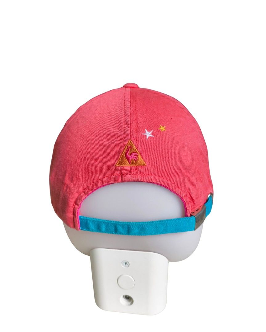 Le Coq Sportif Esprit de Golf Cap (Category: Caps & Hats) located in Davao. Submitted by dreytohan (Listing ID 1397581553, Image 2). Description: - Le Coq Sportif cap - Coral color with turquoise strap - 'Esprit de Golf' embroidery - Adjustable strap for a perfect fit - Curved brim - Classic baseball cap design.