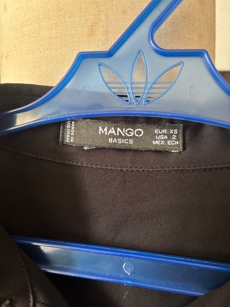 Mango Button Down (Category: Blouses) located in Mandaluyong City. Submitted by travelholic89 (Listing ID 1397434991, Image 2). Description: Mango Sheer Button Down Size on tag: XS Can fit up to MEDIUM since it’s oversized Php 200 + SF.