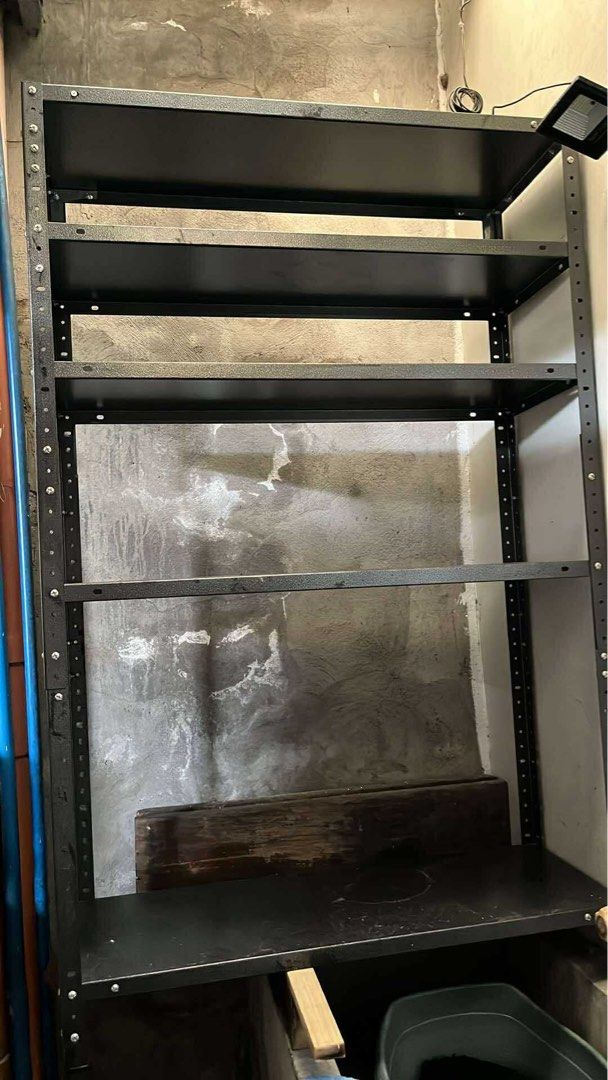 METAL RACK 5-LAYER (Category: Shelves, Cabinets & Racks) located in Pasig City. Submitted by _aedm (Listing ID 1397426951, Image 1). Description: - Sturdy metal shelving unit - Multiple shelves for storage - 5 metal layers.