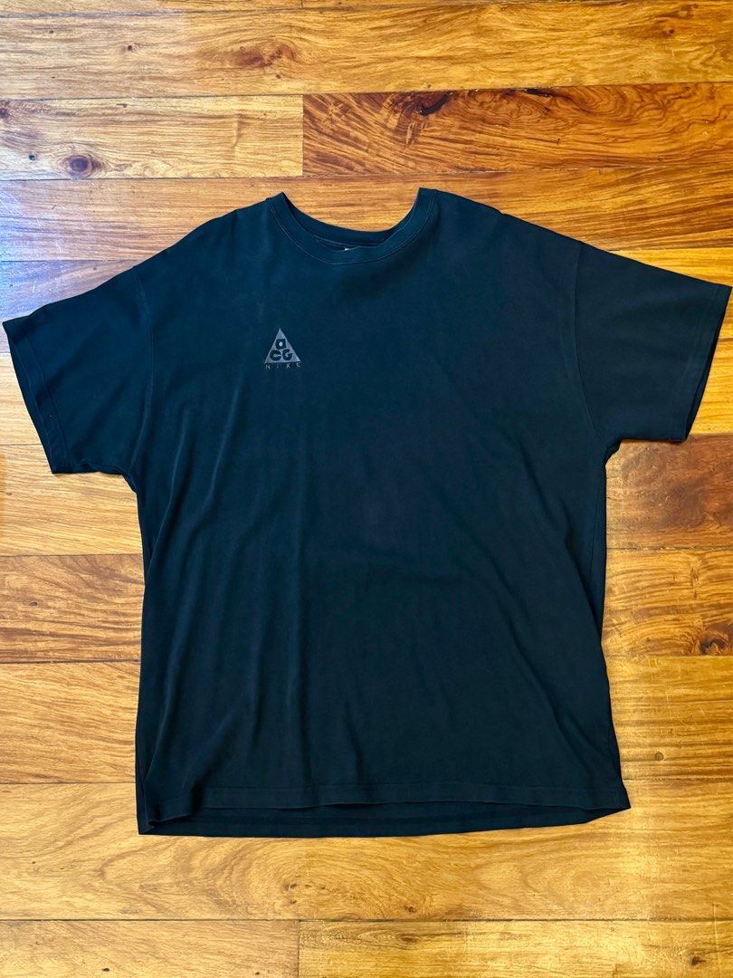 Nike ACG T-shirt (Black) (Category: Tshirts & Polo Shirts ) located in Manila. Submitted by declutter071996 (Listing ID 1397553178, Image 1). Description: Nike ACG T-shirt (Black) Size L (oversized to XL) No issues / Good condition P1,000.