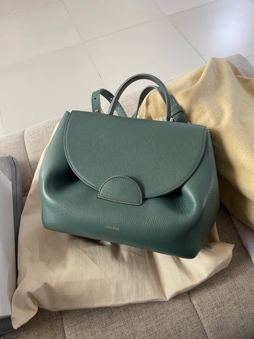 Polène Numéro Sept Handbag (Category: Luxury Bags & Wallets) located in Quezon City. Submitted by secondstreeet (Listing ID 1397454965, Image 2). Description: - Polène Numéro Sept handbag - Stunning teal color - Features a top handle and detachable shoulder strap - Comes with a dust bag - Elegant flap closure - Luxurious gold-toned hardware - Structured design - Spacious interior Polene Bag 29,000 Barely used.
