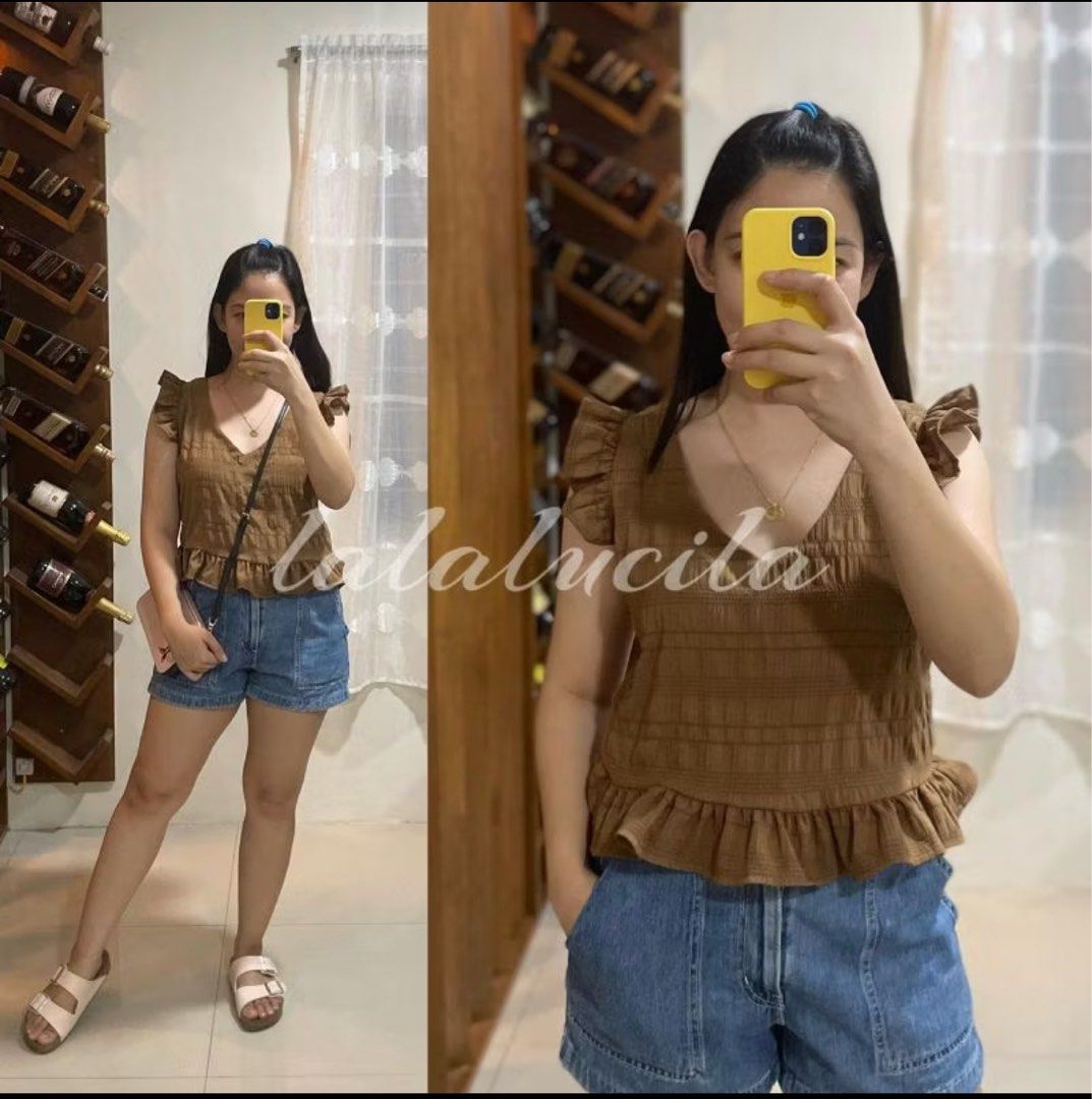 Ruffle Top (Category: Sleeveless) located in Manila. Submitted by cazly (Listing ID 1397538245, Image 1). Description: - Stylish ruffle top - Flattering V-neck - Unique back tie detail - Ruffled hem and sleeves - Perfect for a casual chic look - Available colors: Brown, Mint Green.