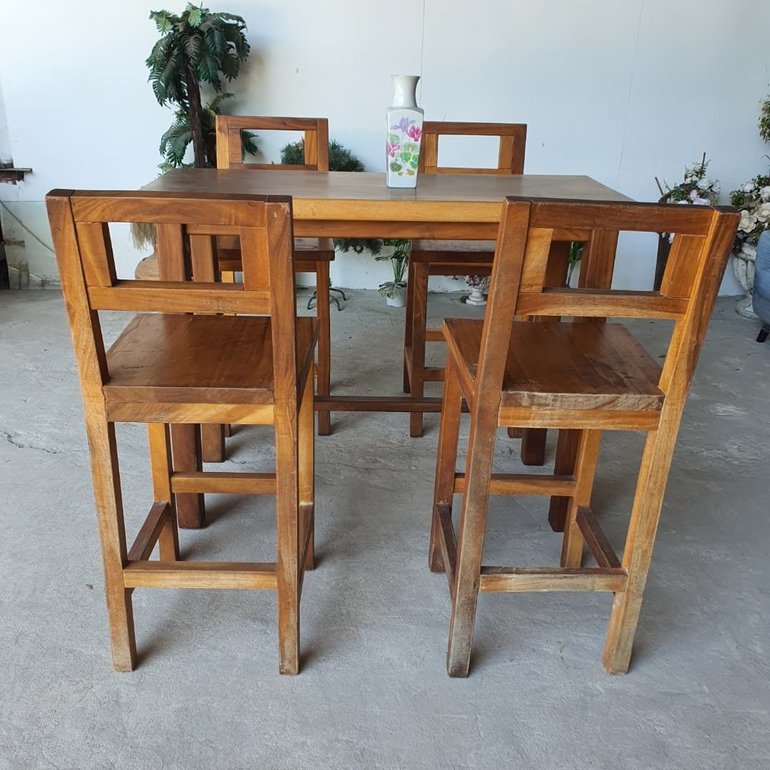 Solid Wood Rectangular 4-Seater Bar Table (Category: Tables & Sets) located in Shah Alam. Submitted by unearthstore (Listing ID 1397481038, Image 1). Description: "Bring rustic charm and lasting durability to your dining or entertainment space with this solid wood rectangular bar table set, complete with 4 matching high chairs. Crafted from solid wood, this set offers a natural finish and sturdy build, perfect for both casual dining and entertain