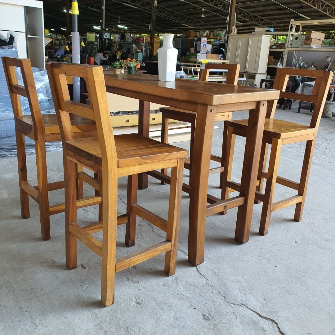 Solid Wood Rectangular 4-Seater Bar Table (Category: Tables & Sets) located in Shah Alam. Submitted by unearthstore (Listing ID 1397481038, Image 2). Description: "Bring rustic charm and lasting durability to your dining or entertainment space with this solid wood rectangular bar table set, complete with 4 matching high chairs. Crafted from solid wood, this set offers a natural finish and sturdy build, perfect for both casual dining and entertain