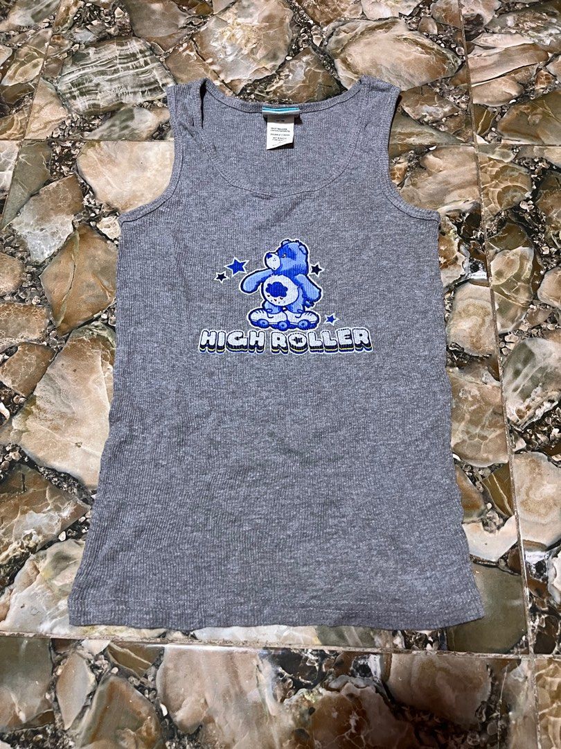 Vintage carebears tank top (Category: Sleeveless) located in Manila. Submitted by jvp_goods (Listing ID 1397457471, Image 1). Description: Vintage carebears tank top No issues Medium on tag also fits small Dated 2005.