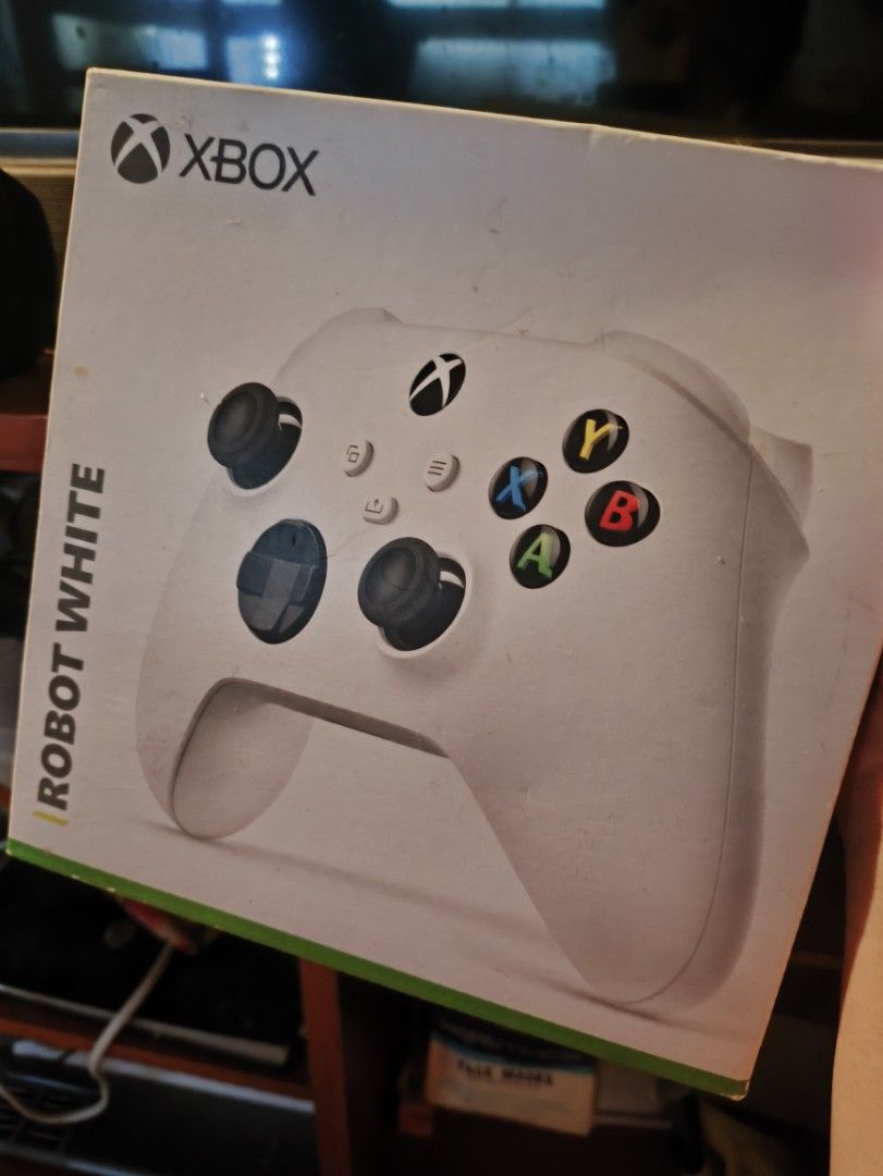 XBox Series X Wireless Controller Robot White (Category: Controllers) located in Quezon City. Submitted by toysties (Listing ID 1397437324, Image 2). Description: Xbox Wireless Controller in Robot White color. With original box. bought in GameXtreme shoppee. Rfs: decluttering .