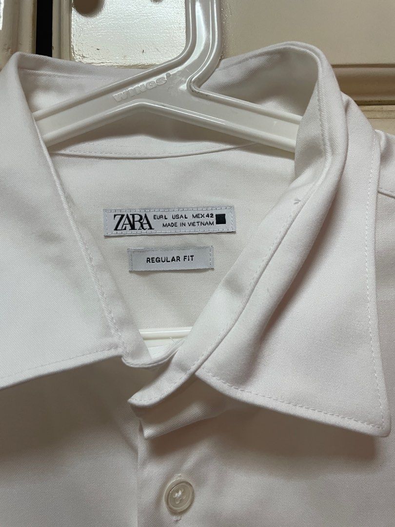 Zara Regular Fit White Shirt (Category: Tshirts & Polo Shirts ) located in Makati City. Submitted by masaca (Listing ID 1397441855, Image 2). Description: - Zara white long-sleeved shirt - Regular fit - Classic collar - Button-down front and cuffs - Size: EUR L, USAL L, MEX 42 - Made in Vietnam.